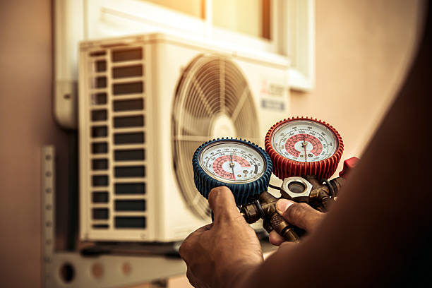 Professional Hvac technician working in Paoli, IN